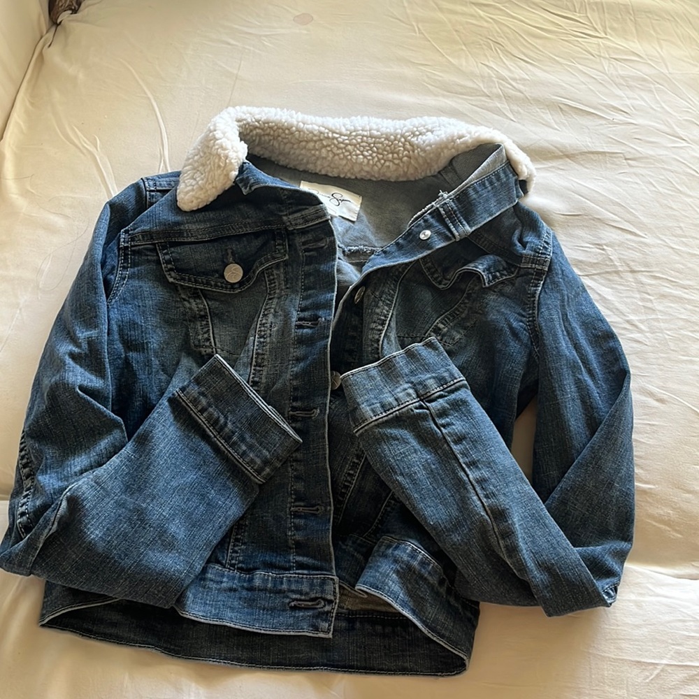 Jessica Simpson faux fur collar denim jacket. Fitted and true to size